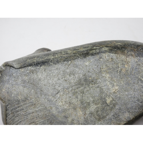 323 - An Inuit carved stone sculpture of a Walrus, scratch signed 'Jimmy' to underside 6 1/2in L