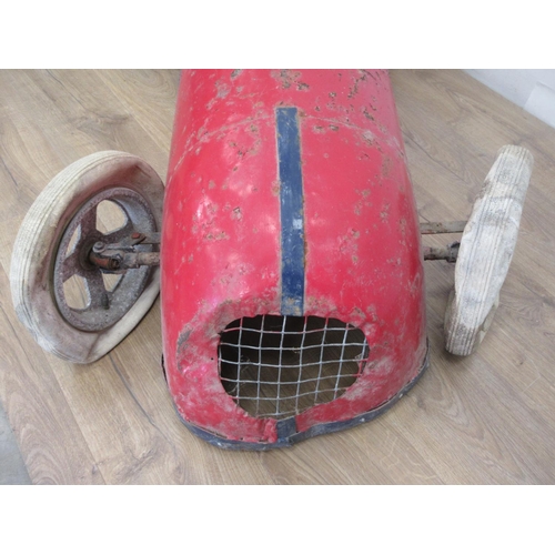 325 - A mid 20th Century Pedal Car with red and blue livery, with pneumatic tyres, requires some attention... 