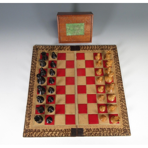 326 - A Staunton Chess Set by Jaques & Son, London with boxwood and ebonised pieces and including Moroccan... 