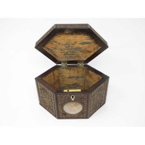 336 - A Georgian mahogany and rolled paper Tea Caddy of hexagonal form with circular convex glass covered ... 