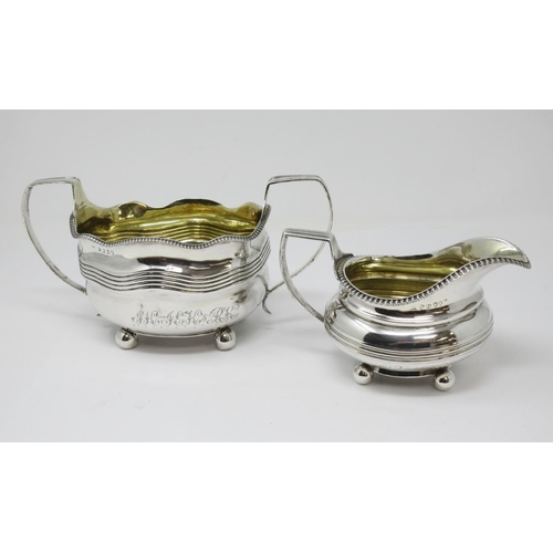 34 - A George III silver large two-handled Sugar Bowl and Milk Jug with egg and dart rims, engraved initi... 