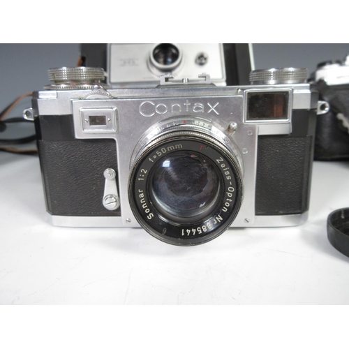 340 - A Contax 35mm Camera with 2/50 Zeiss-Opton Lens, two Pentax 35mm Cameras and a Polaroid 355 automati... 