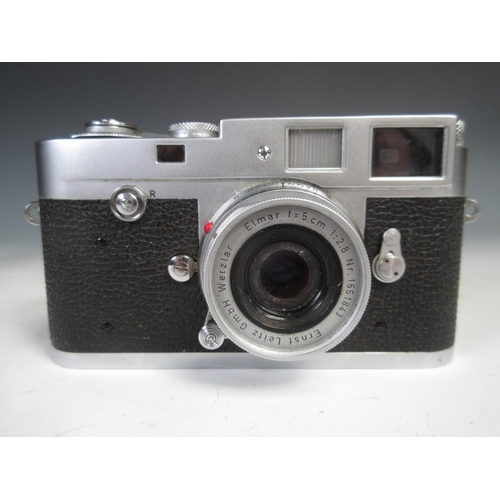 341 - A Leica M2 Rangefinder Camera, C.1958, No. 930 932, with f2/2.8 Elmar lens, No.1551843, and a Leica ... 