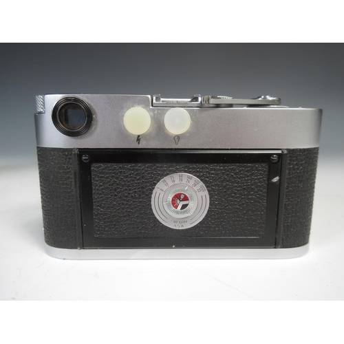 341 - A Leica M2 Rangefinder Camera, C.1958, No. 930 932, with f2/2.8 Elmar lens, No.1551843, and a Leica ... 