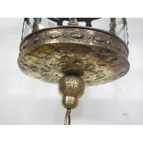 351 - A 19th Century brass Hanging Lantern, the ball and crown finial above the glazed circular light with... 