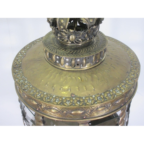 351 - A 19th Century brass Hanging Lantern, the ball and crown finial above the glazed circular light with... 