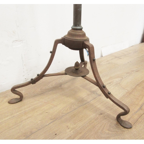 374 - An Arts & Crafts Standard Lamp with brass telescopic column on wrought iron tripod base, centred by ... 