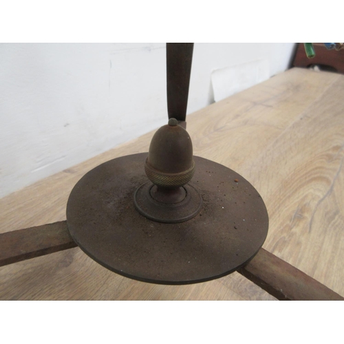 374 - An Arts & Crafts Standard Lamp with brass telescopic column on wrought iron tripod base, centred by ... 