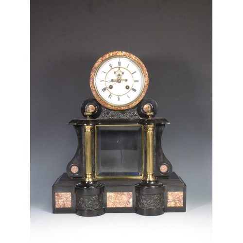 380 - A black slate Empire style Mantel Clock by Duplan & Salles with embossed panels depicting Putti and ... 