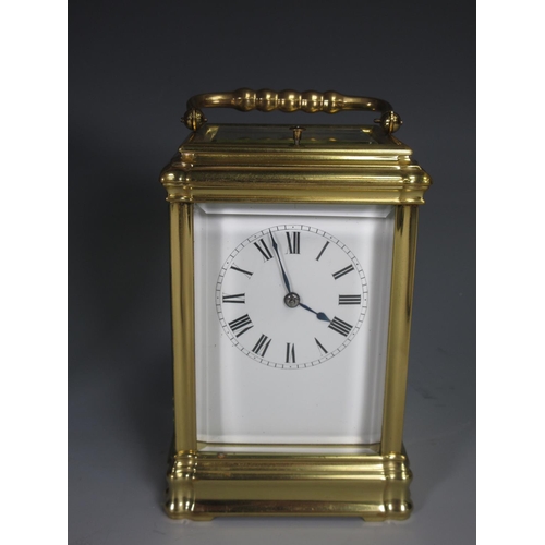 383 - A brass cased Grand Sonnerie Carriage Clock inscribed No.985 to underside within fitted leather case... 