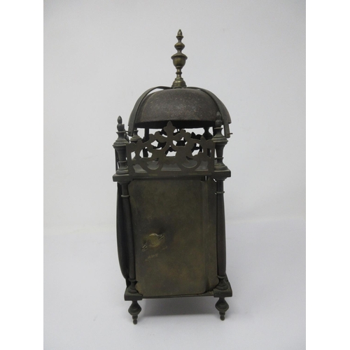 387 - An 18th Century style Lantern Clock with later movement, brass chapter ring and striking on a bell, ... 