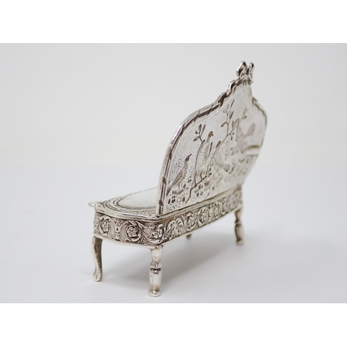 39 - An Edward VII Continental silver miniature Settee decorated birds with ribbon surmount. Import mark,... 