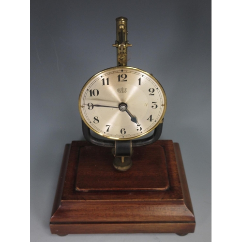 397 - A Bulle Mantel Clock in glazed and mahogany Case on bun feet 10 1/2in H x 7in W