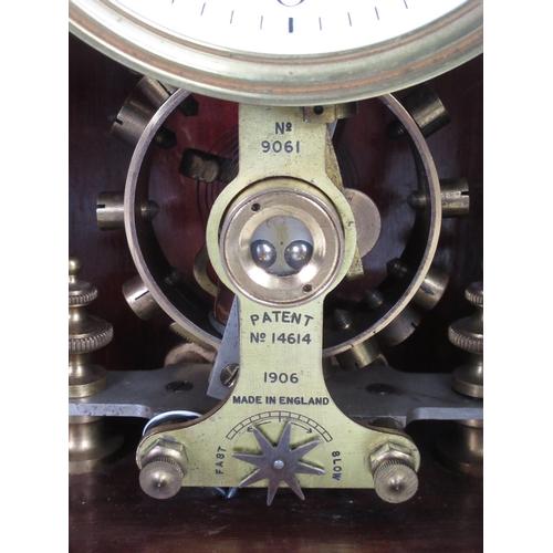 401 - A Eureka electric Mantel Clock No.9061, Patent No.14614 1906 in mahogany case 15in H x 11in W