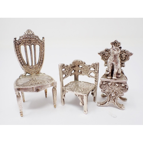 42 - A Victorian Continental silver miniature shield back Chair. Import mark London 1892, another Chair w... 