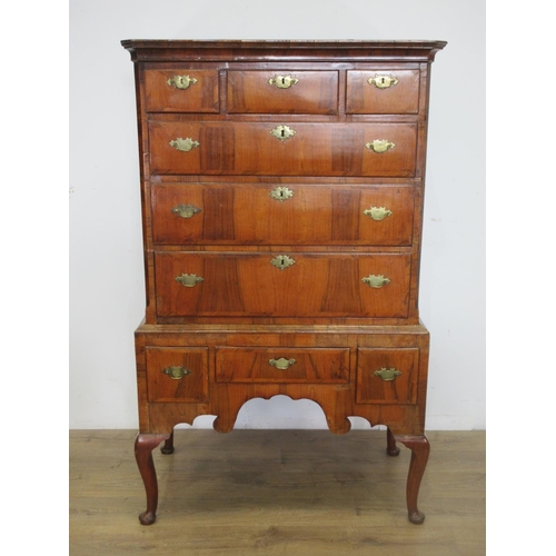 436 - An 18th Century walnut Chest on Stand, the upper section with three short drawers over three long, t... 