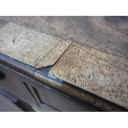 441 - A Georgian walnut Lowboy fitted three drawers with a quarter veneered and crossbanded top, fitted th... 