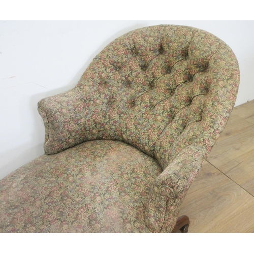 442 - A 19th Century walnut Day Bed, the button down bowed end above a stuff over seat and swept foot rest... 