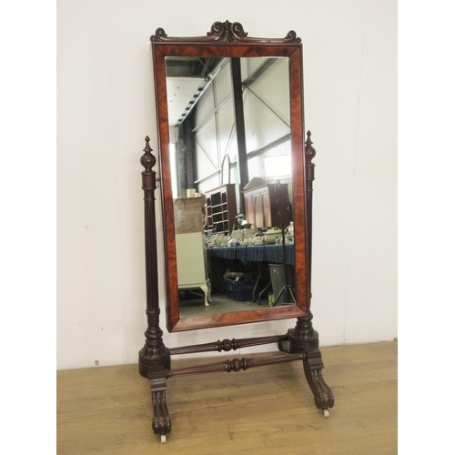 450 - A 19th Century carved mahogany Robing Mirror, the cushion framed mirror between taper turned fluted ... 