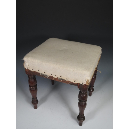 452 - A Georgian mahogany framed Footstool on turned supports, 1ft 3in H x 1ft 2in W x 1ft D.