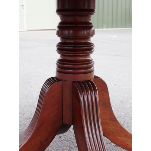 455 - A Regency mahogany Breakfast Table with rounded rectangular top on turned column and quadruple reede... 