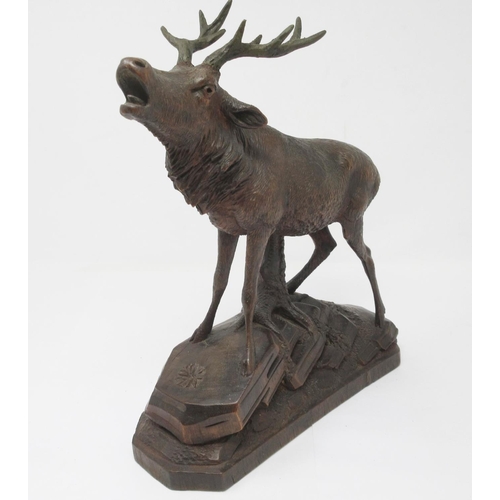 465 - N. DENEFFE. A finely carved Black Forest Stag on naturalistic base, 10in, antlers possibly restored