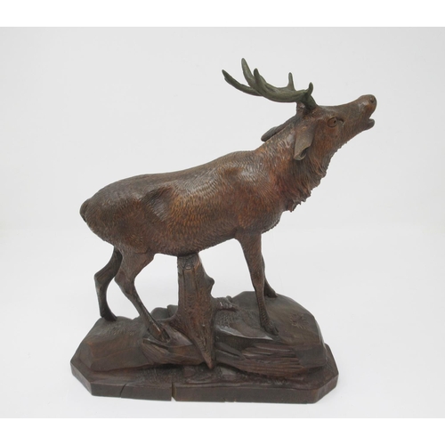 465 - N. DENEFFE. A finely carved Black Forest Stag on naturalistic base, 10in, antlers possibly restored