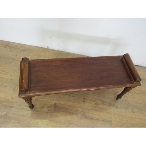 471 - A 19th Century mahogany Hall Bench with moulded blocks above a rectangular seat raised on taper turn... 