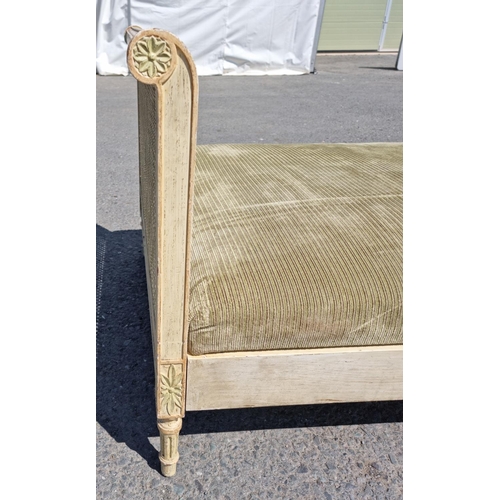 472 - A French style painted Daybed with double caned head and footboard, scrolled ends with carved patter... 