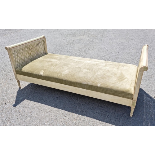 472 - A French style painted Daybed with double caned head and footboard, scrolled ends with carved patter... 