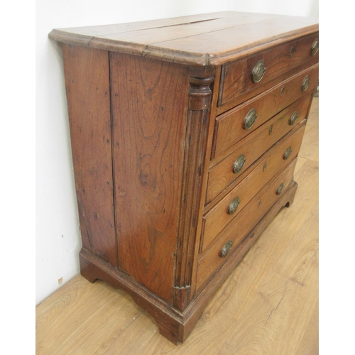 475 - A 19th Century elm Chest of four long drawers with quarter round pilasters and raised on bracket sup... 