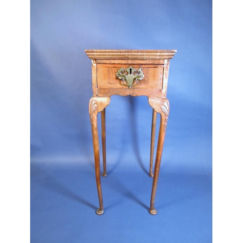 479 - An 18th Century walnut Jardiniere Stand with feather banded and quarter veneered top, fitted frieze ... 