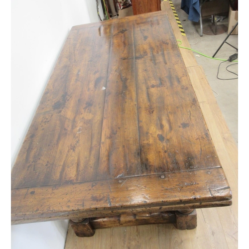 481 - An oak drawleaf Dining Table in the 18th Century style with cleated top on baluster supports and squ... 