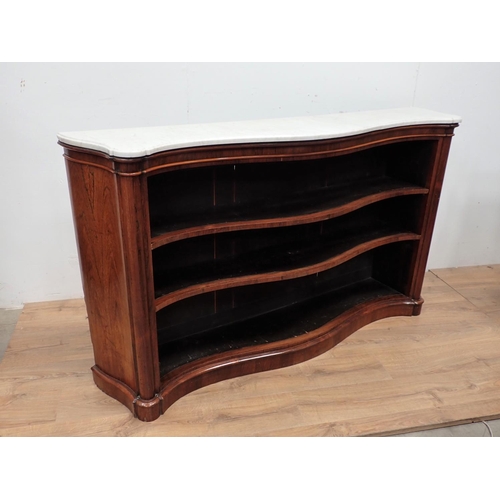 487 - A 19th Century marble topped rosewood serpentine fronted open Bookcase with adjustable shelves on pl... 