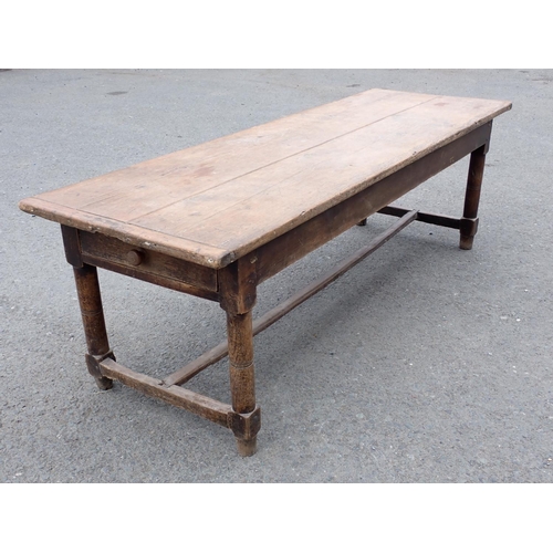 494 - An 18th Century Kitchen Table with cleated two plank pine scrub top on oak base fitted end drawer up... 