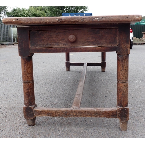 494 - An 18th Century Kitchen Table with cleated two plank pine scrub top on oak base fitted end drawer up... 