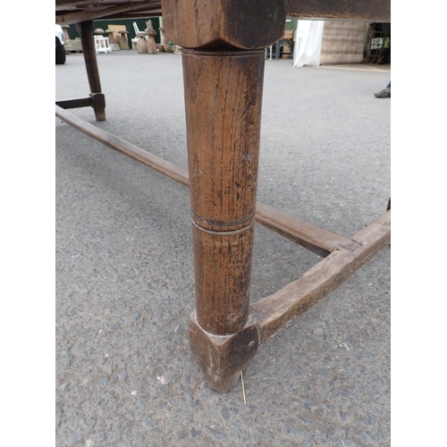 494 - An 18th Century Kitchen Table with cleated two plank pine scrub top on oak base fitted end drawer up... 