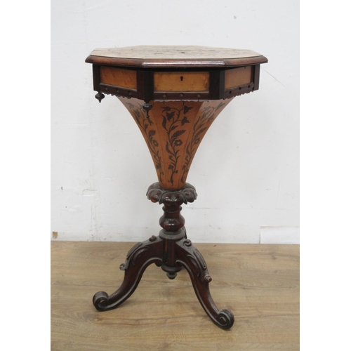 498 - A Victorian Sewing Table with marquetry inlay having octagonal hinged top enclosing fitted compartme... 