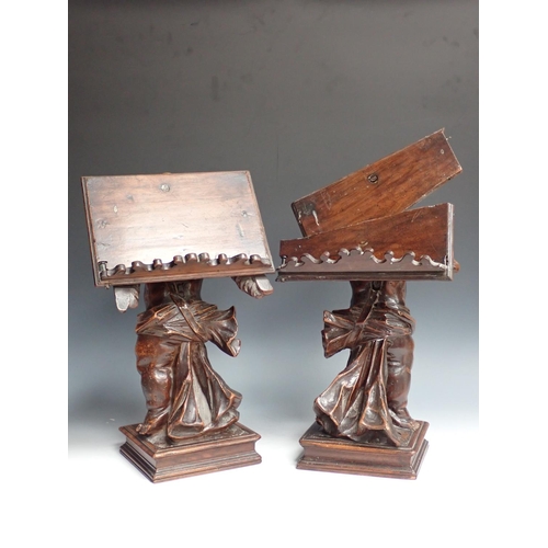 500 - Two Italian 18th Century walnut Reading/Music Stands with standing winged Cherub figures on oblong b... 