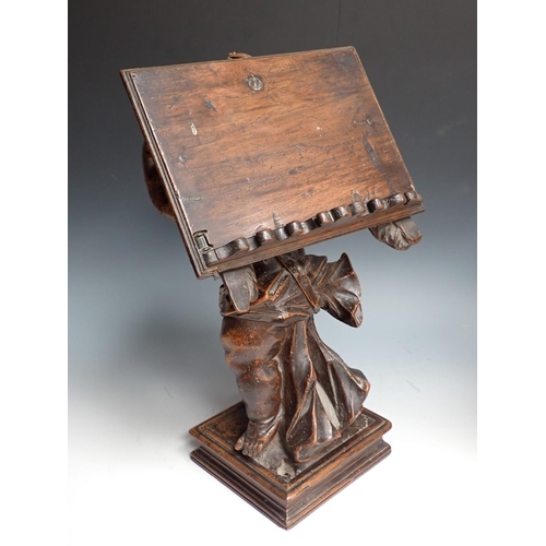 500 - Two Italian 18th Century walnut Reading/Music Stands with standing winged Cherub figures on oblong b... 