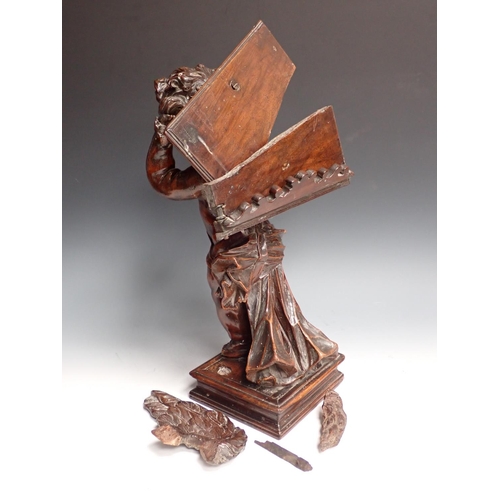 500 - Two Italian 18th Century walnut Reading/Music Stands with standing winged Cherub figures on oblong b... 