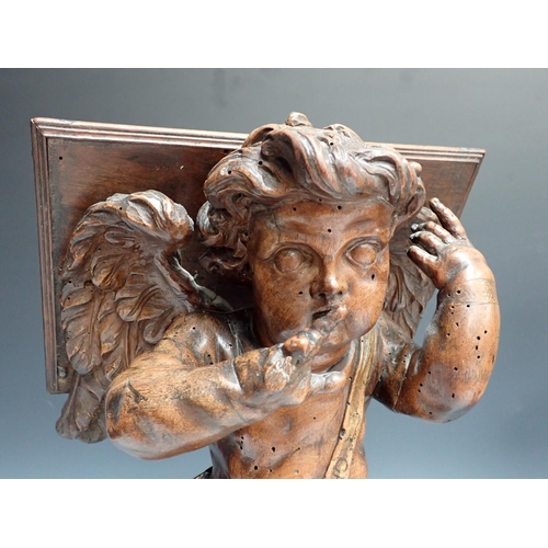 500 - Two Italian 18th Century walnut Reading/Music Stands with standing winged Cherub figures on oblong b... 