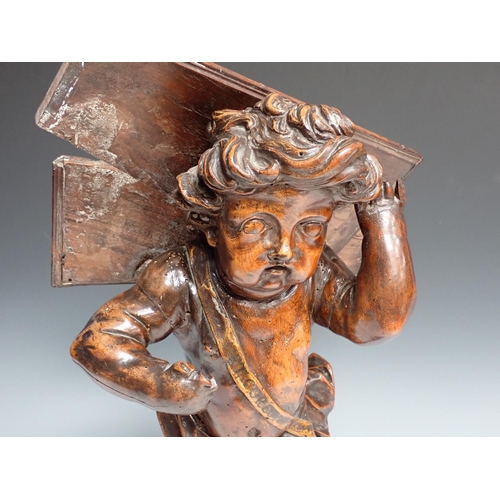 500 - Two Italian 18th Century walnut Reading/Music Stands with standing winged Cherub figures on oblong b... 