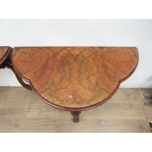 501 - A pair of Victorian walnut fold-over Card Tables of trefoil shape with green and red baize interior ... 