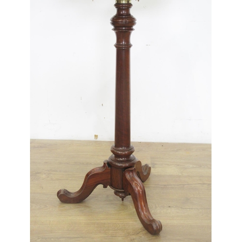 502 - A 19th Century walnut double-sided adjustable Music Stand with pierced fret carving in the form of a... 