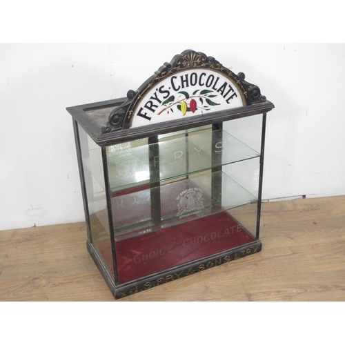 508 - A late 19th or early 20th Century Fry's Chocolate glazed Display Cabinet with arched surmount decora... 