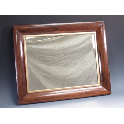 514 - A 19th Century rosewood framed Wall Mirror with gilt slip and bevelled plate, 1ft 9in a 2ft 2in