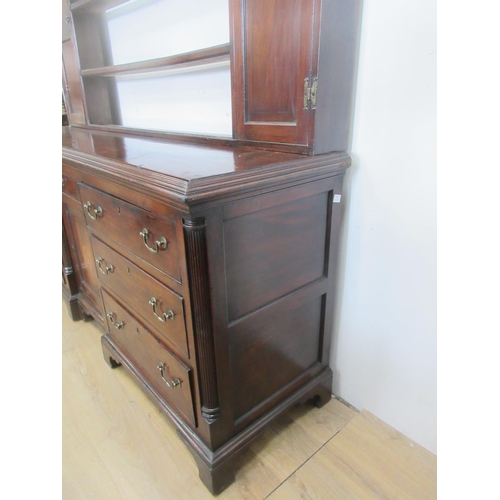 519 - A Georgian mahogany Dresser and Rack with shaped frieze flanked by cupboard doors, the base fitted a... 