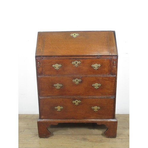 522 - An 18th Century oak Bureau of small proportions with fitted interior above three drawers on bracket ... 