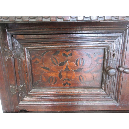 528 - A primarily 17th Century oak Deuddarn with carved frieze dated 1563 with serpent decoration above a ... 